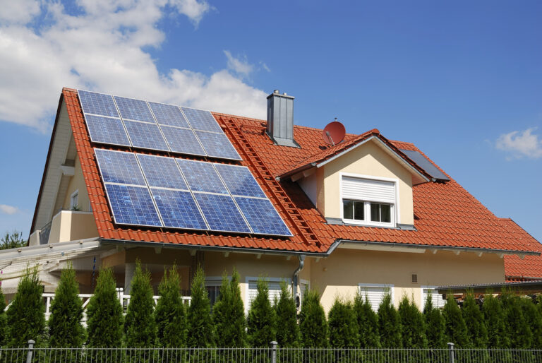 Solar panels on a house roof, roof leaking